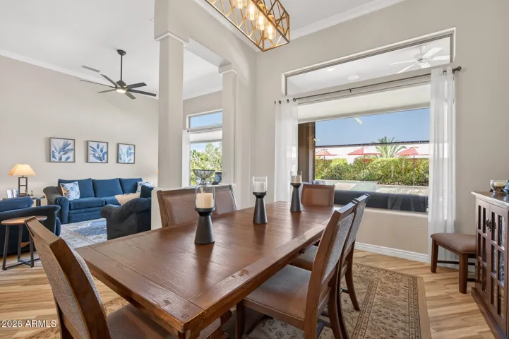 Enjoy views of the back yard and pool from the dining room.