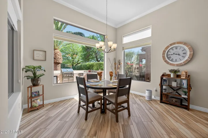This space is right off the kitchen and family room and overlooks the back yard & outdoor kitchen.