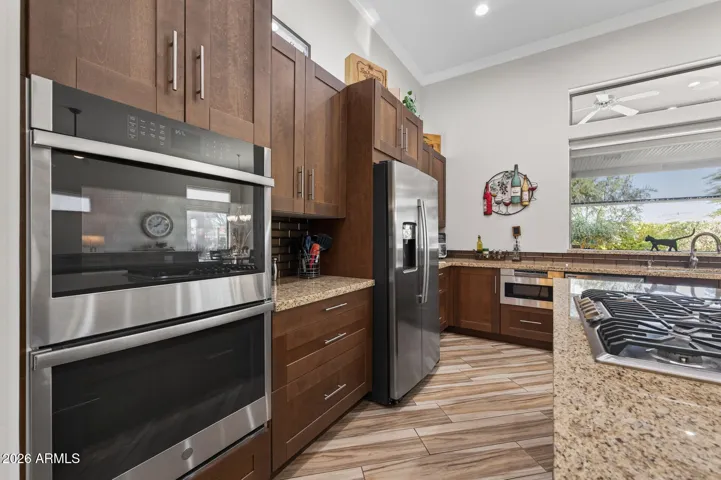 Double wall ovens are features of the kitchen.