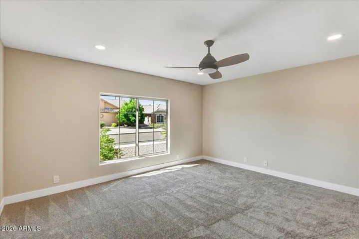 Secondary primary bedroom has plenty of space for your guests or home office