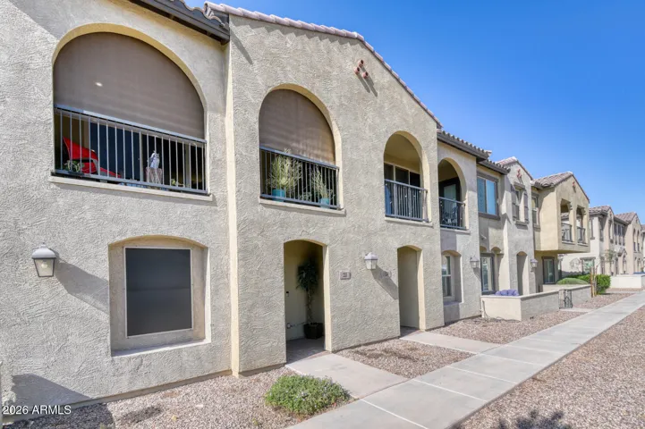 Unit features roll down shades on the balcony.