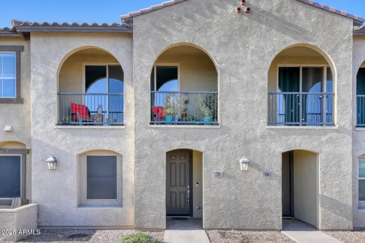 Two-story unit featuring large balcony.