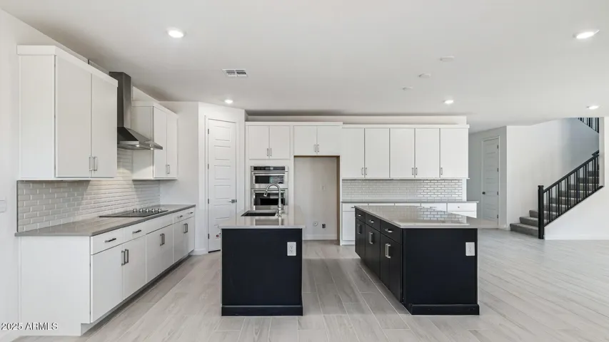 Luxury Kitchen featuring double islands
