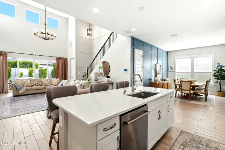 SPACIOUS GREAT ROOM ADJACENT TO DINING ROOM AND KITCHEN