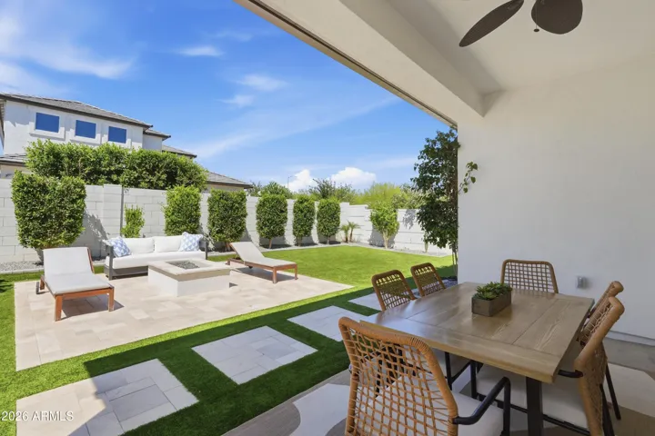 TRANQUIL BACKYARD RETREAT WITH TRAVERTINE FIREPIT