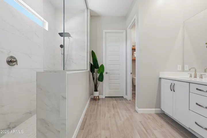 MODERN LUX SPA-LIKE PRIMARY BATH WITH CUSTOM STONE SHOWER