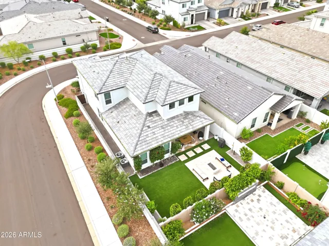 AERIAL VIEW OF STUNNING AND PRIVATE BACKYARD ON A CORNER LOT