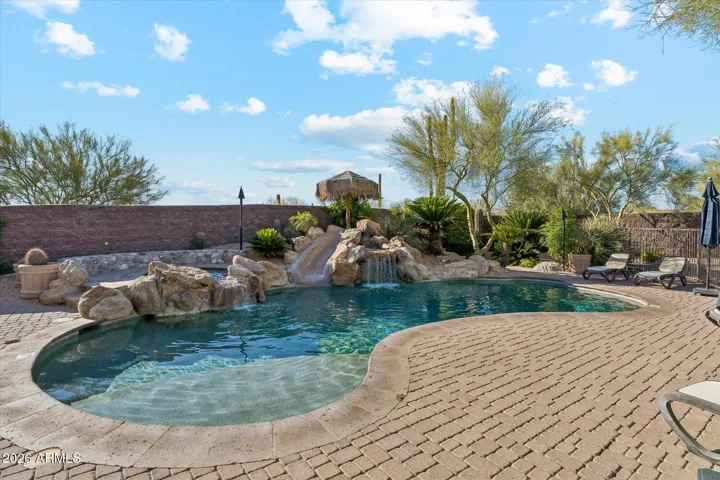 Heated pool, spa, waterfall & slide...