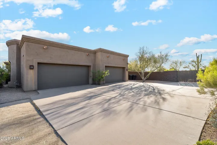 4-garage with abundant storage room & epoxy, guest parking