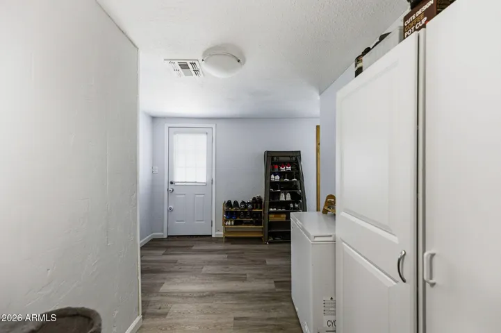 Convenient large mudroom located next to access to roomy backyard