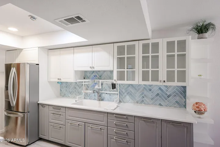 ** Beautifully spacious kitchen featuring crisp white cabinetry**