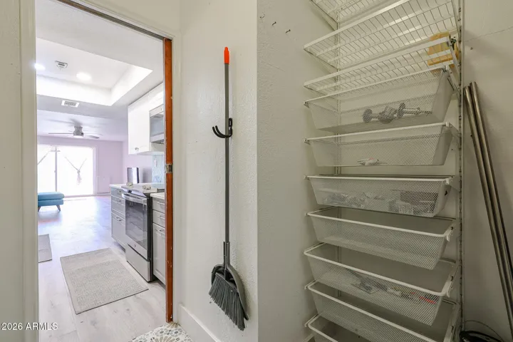 **"This modular command center utilizes an adaptive pegboard system with customizable hooks and handles, keeping all your essential handyman tools streamlined and within arm's reach."**