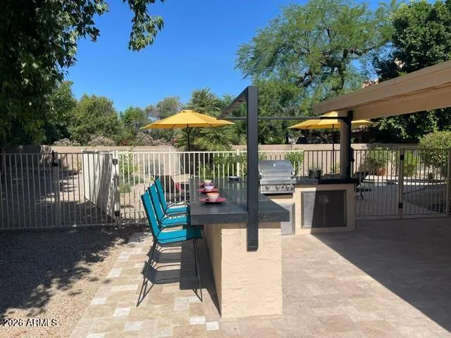 Entertain/BBQ at Large Outdoor Patio Area Off Pool/Family Room with Custom Overhead Light Bar