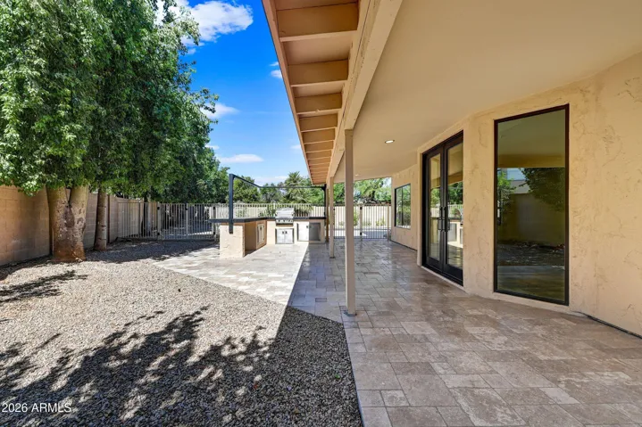 Large Covered Patio Across the Back of Home