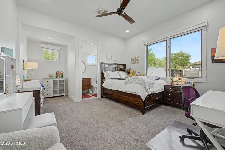 Ensuite bedroom 2 on ground level is light and bright