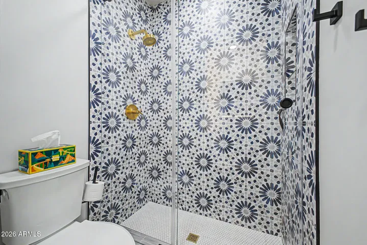 Beautiful new bathroom located in the basement remodeled in 2023