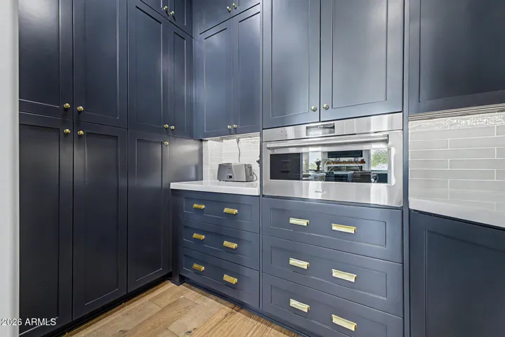 Beautiful, convenient butler pantry with extensive storage