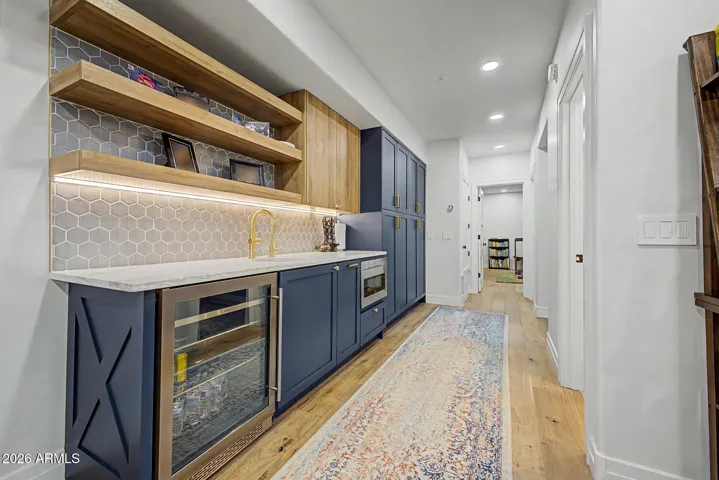 Spacious basement features huge living/family room with kitchenette