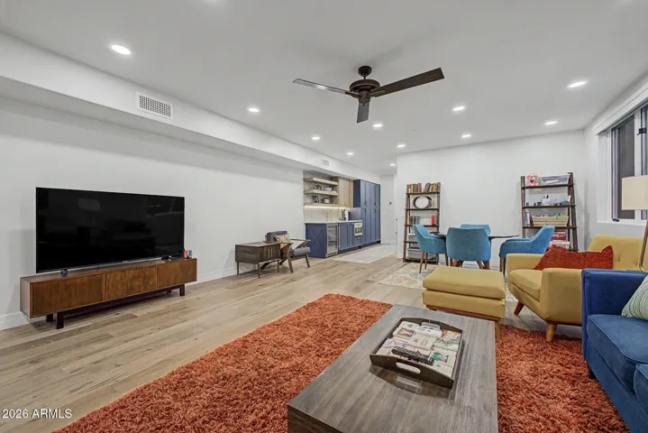 Spacious basement features huge living/family room with kitchenette