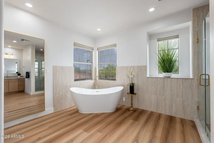 Primary bath with soaking tub, walk-in shower and double vanities