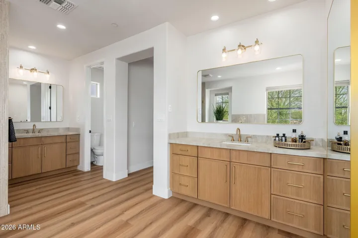 Primary bath with soaking tub, walk-in shower and double vanities