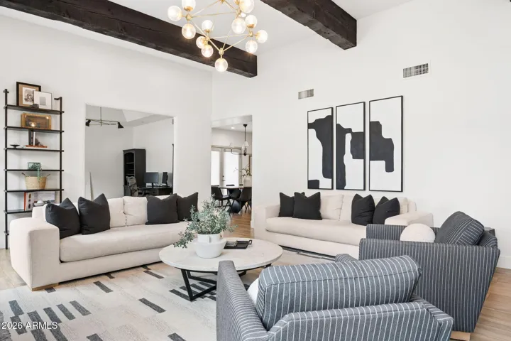 Formal dining is currently used as a home office.