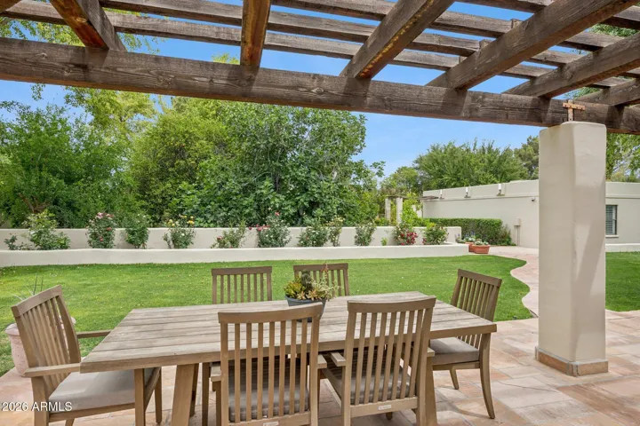 Enjoy a garden filled with the most amazing fig tree, pomegranate, orange trees, and roses, all on irrigation for easy, low-maintenance living.