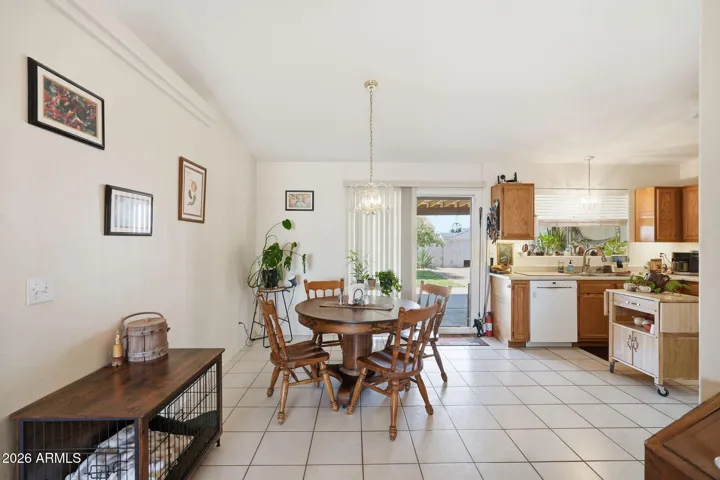 Enjoy open spaces in the dining area to either the kitchen or the living room - also exit to patio.