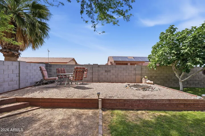 this area is great to enjoy in the cooler months with the in-ground firepit