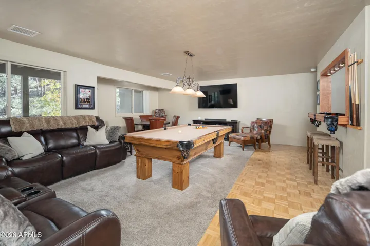 Game room with full sized pool table