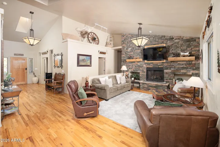 Family room with gas fireplace and sky lights