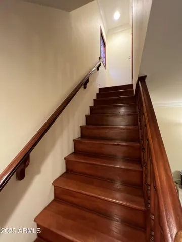 Private staircase from bonus room (billiard room) to 2nd floor ensuite bedroom/bathroom