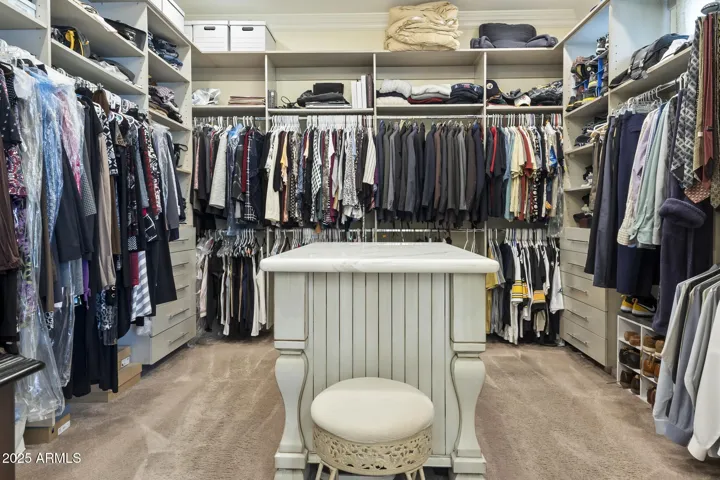 Upper level primary ensuite walk-in closet