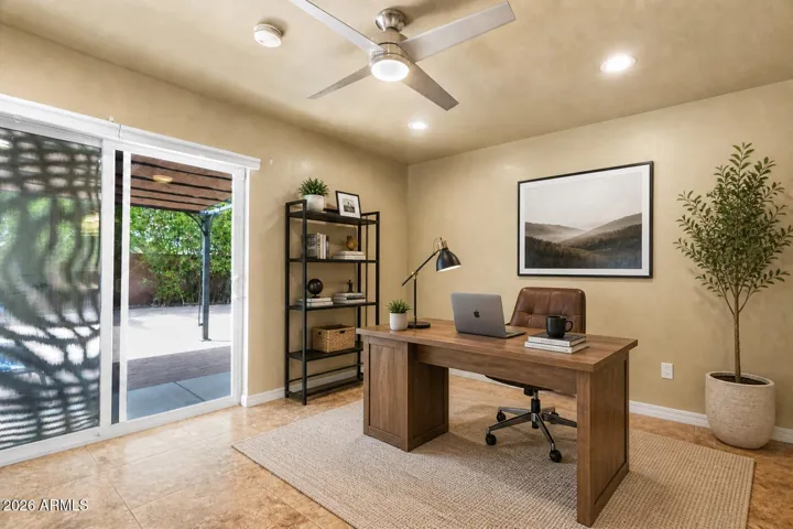 Virtually staged as a home office.