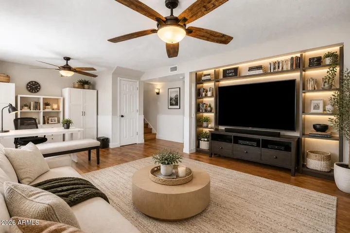 Virtually staged. Entertainment center has been virtually installed.