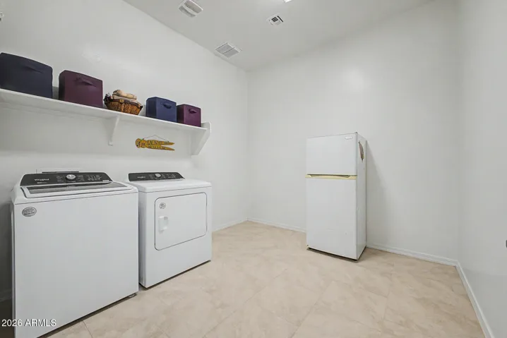 This laundry room is bigger than any space I've ever had to myself. (I blame my wife).