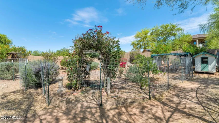 The property includes a chicken coop with enclosed run currently home to 3 chickens.