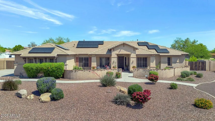 Welcome to your private retreat in the gated community of Mountain Gate—where space, comfort, and Arizona living come together on over an acre of beautifully designed property.