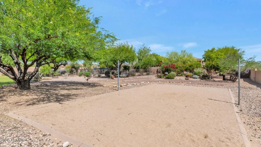 Sand volleyball court ready for play—perfect for weekend games, entertaining, and enjoying your own private outdoor recreation space.