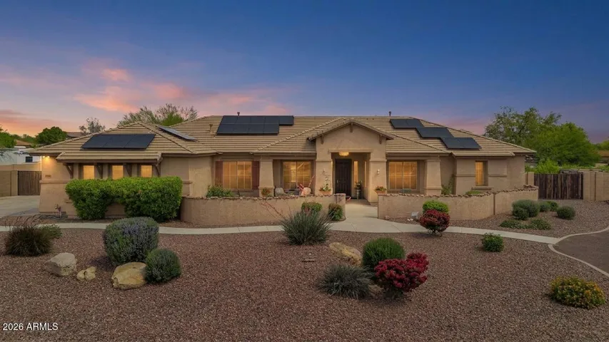 Welcome to your private retreat in the gated community of Mountain Gate—where space, comfort, and Arizona living come together on over an acre of beautifully designed property.
