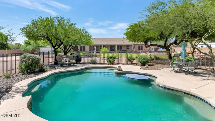 Step into your own backyard oasis complete with a sparkling pool and thoughtfully designed spaces to relax, entertain, and enjoy Arizona living at its best.