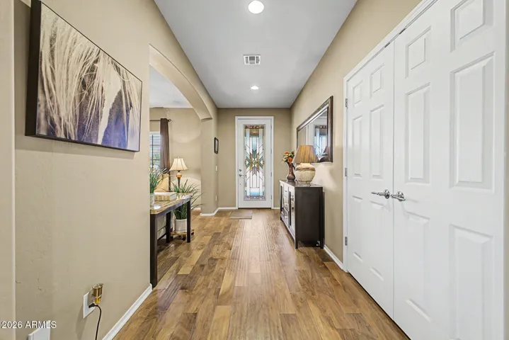 Glass Door highlights the gorgeous wood flooring