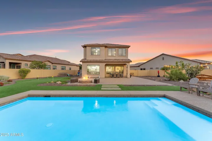 Huge yard with NEW pool, putting green, outdoor kitchen, pergola, picnic area and more!!!