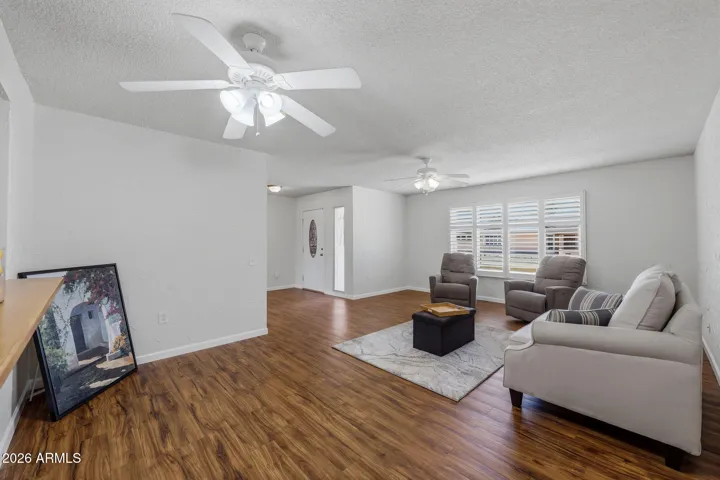 Luxery Vinyl Plank was recently added in the Living, Arizona/Dining & Hall areas. Freshly painted throughout this home offers a bright and cheerful living space!