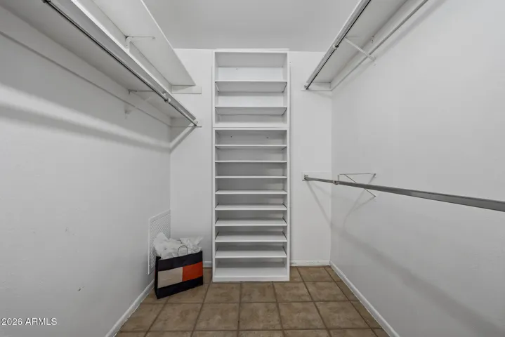 Abundant storage found within the Guest walk in closet.