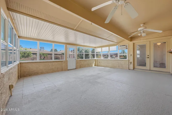 A super spacious 3 Season Enclosed Patio allows for easy entertaining or a tranquil space to watch the outdoors.