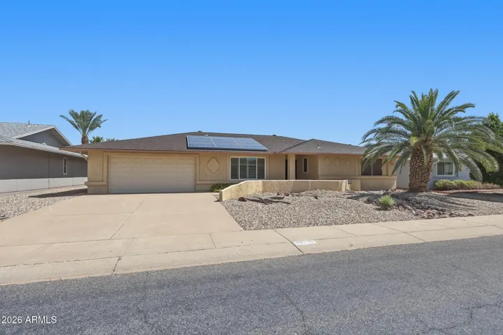 Super street appeal with ample driveway space. Decorative "pony" wall adds a bit of designer appeal to the front walkway.