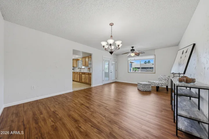 Convieniently located off the Kitchen is a versatile Dining / Sitting / Family Room space, complete with newer Luxury Vinyl Plank floring.