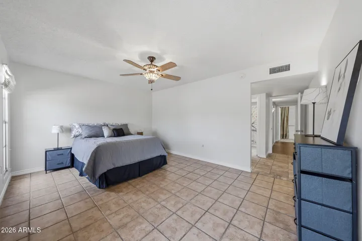The Primary Suite is a private and roomy solitude space.