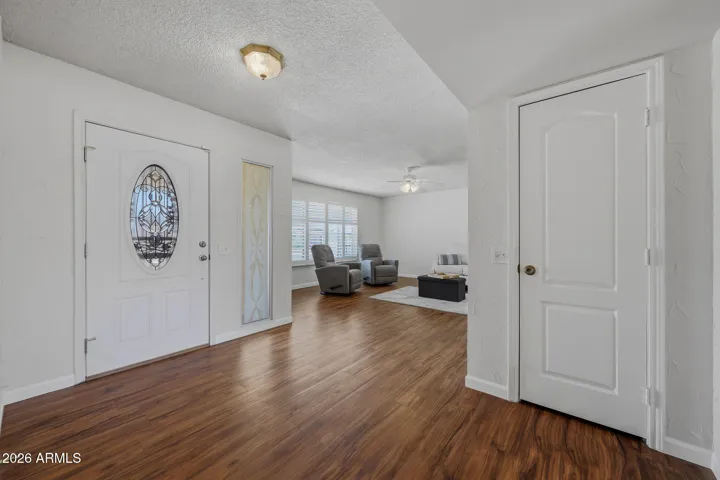 View of entry and guest closet.